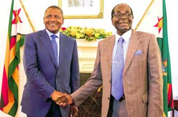 Aliko Dangote from Nigeria, met with Zimbabwean President Robert Mugabe and said he will begin constructing a cement factory in the country.